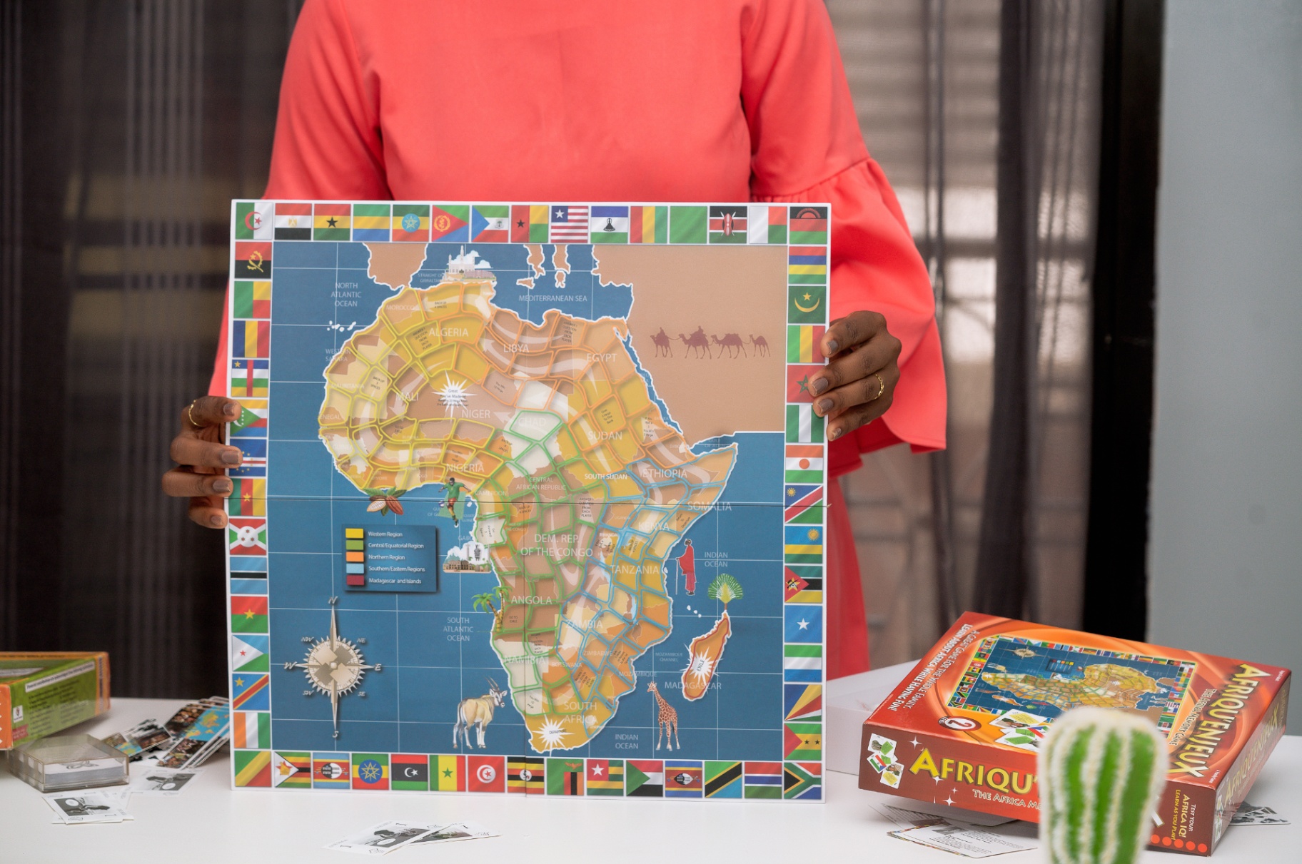 Player holding the illustrated Africa game board